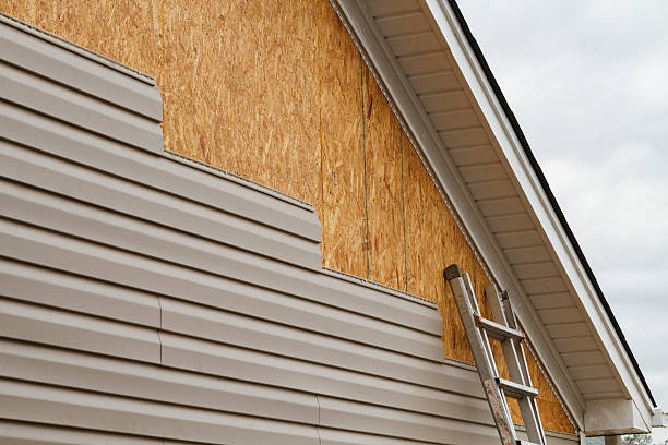 Professional Siding Contractor technician working in Troy, NY